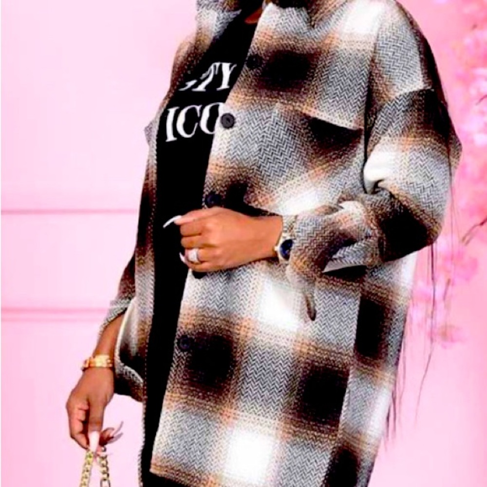 These amazing plaid black, white and brown jacket/coat great wear for fall.